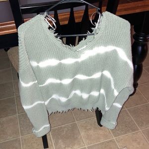 Jessica Simpson off the shoulder sweater.